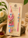 Pink Evil Eye Floral Bhai Bhabhi Lumba Rakhi Set with Tassel
